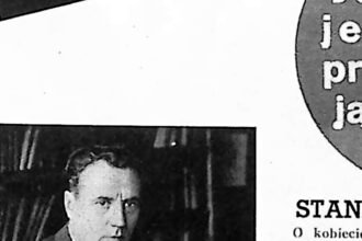 Mężczyzna w garniturze przy biurku, portret prasowy z 1935 roku.