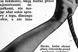 Lotnik w hermetycznym kombinezonie i hełmie z okrągłą szybą, zdjęcie z 1935 roku.